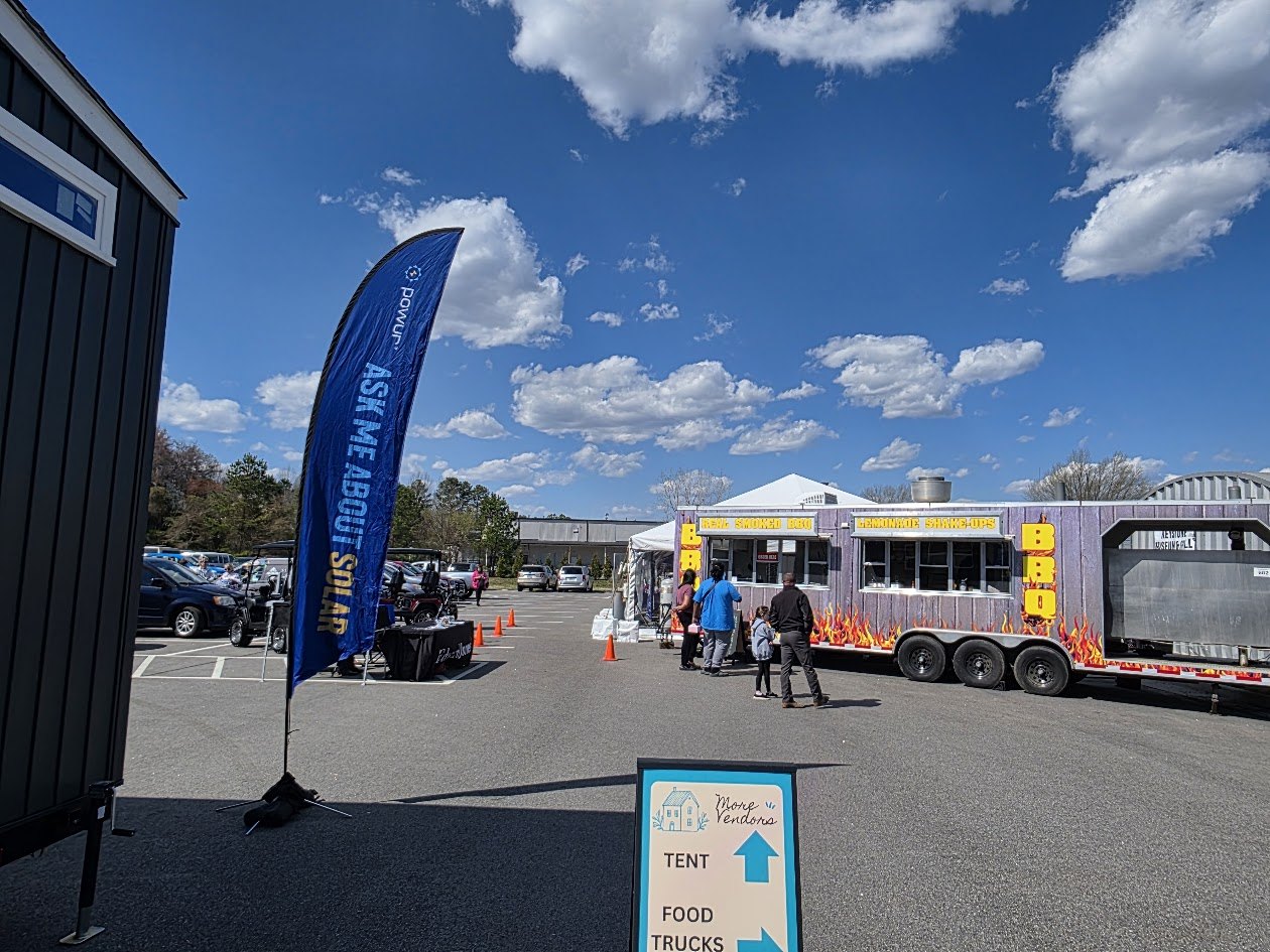 Powur Ask Me About Solar flag at Crozet community festival