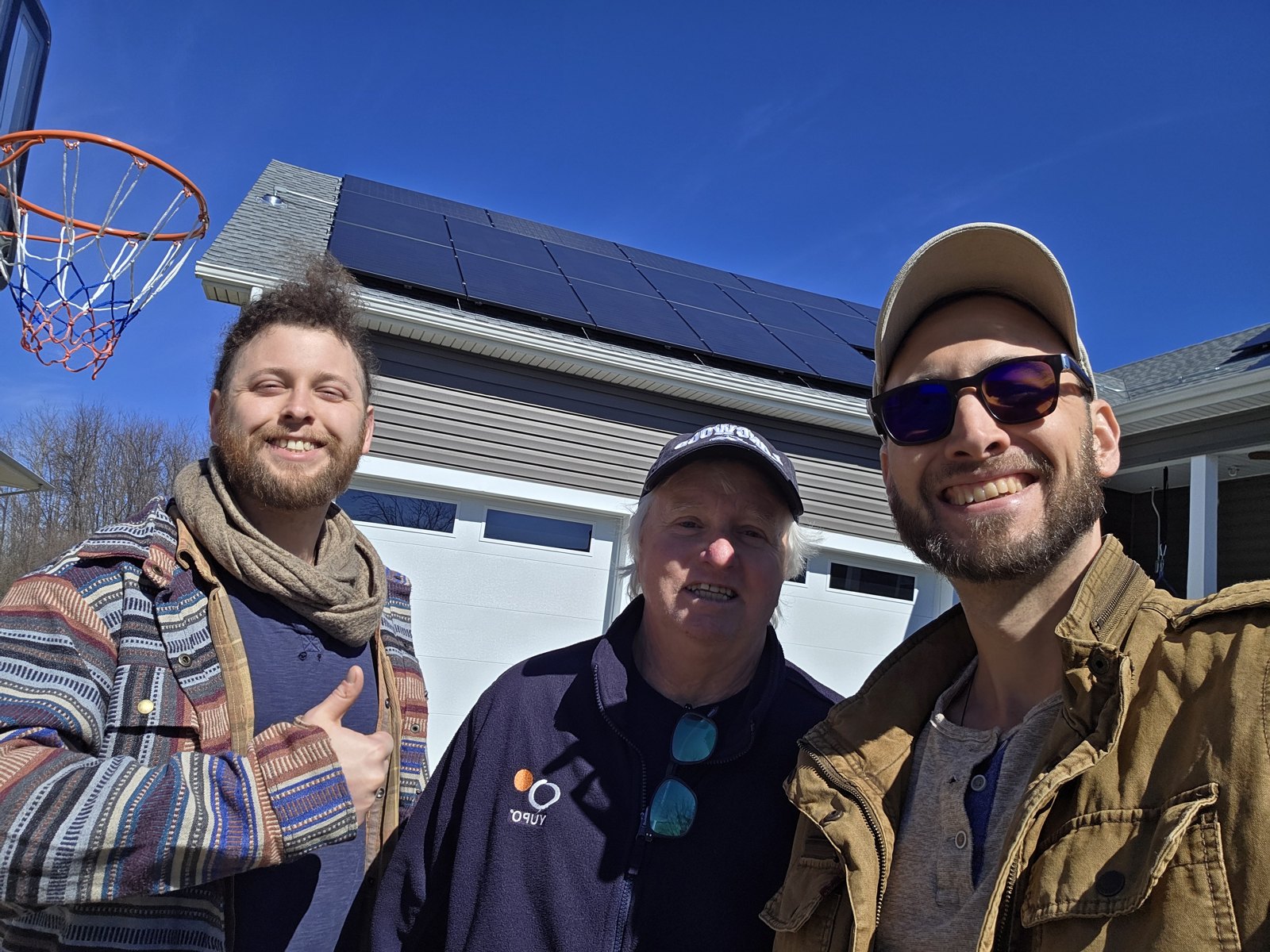 PROSPER team with happy homeowner after solar install — slam dunk in Crozet